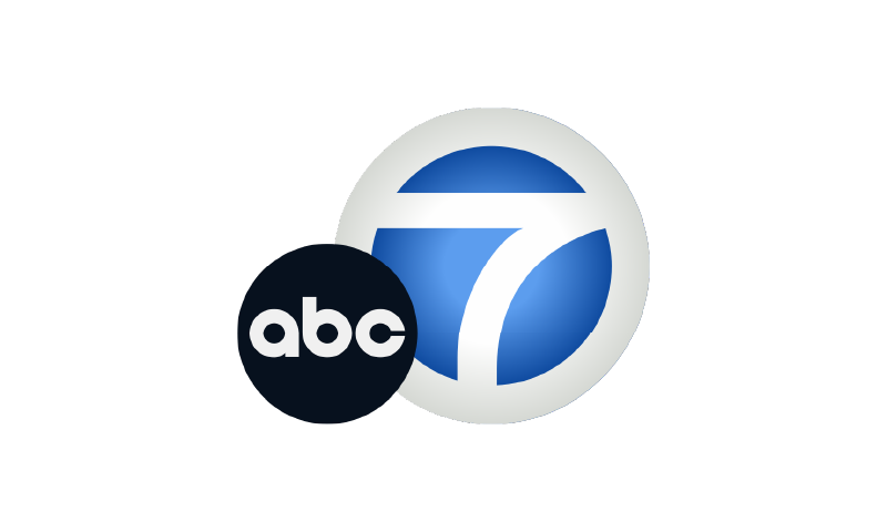 A blue and white logo for abc 7.
