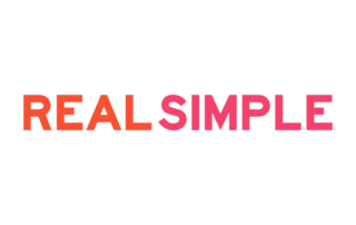 A black background with the words real simple written in pink.