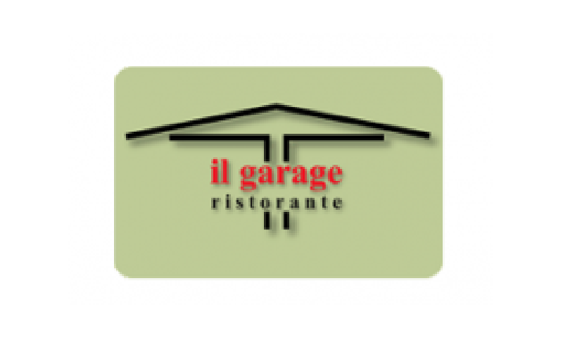 A green background with the words il garage ristorante