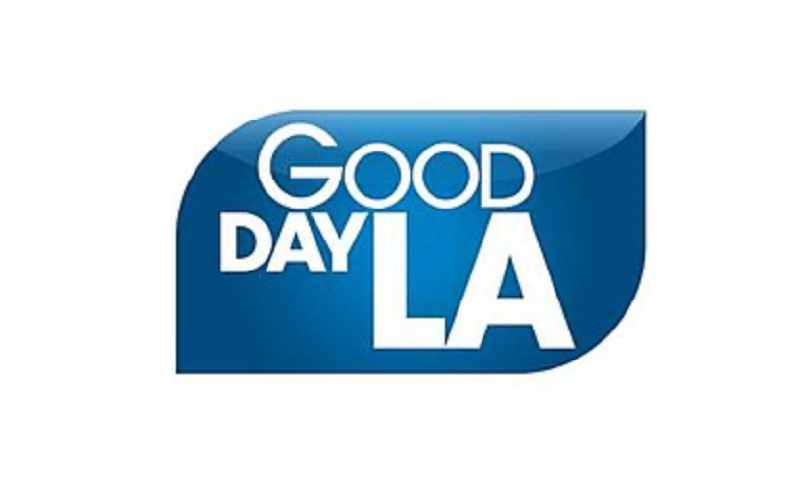 A blue and white logo for good day la.