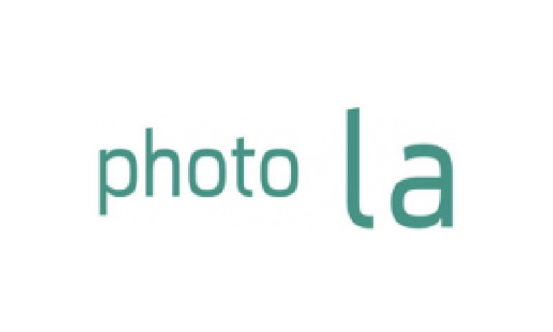 A green and white logo for the photo lab.