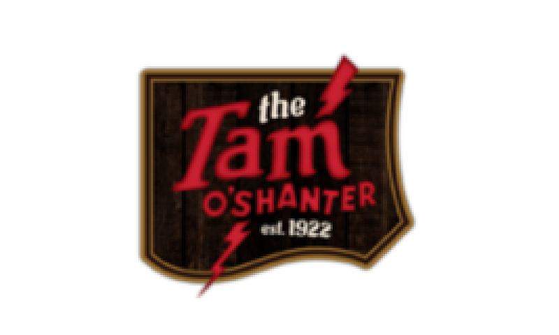 A wooden sign with the name of tam o 's hanter on it.